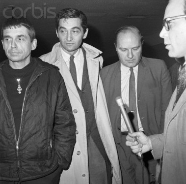 February 1968, New York, USA --- The Reverend Daniel Berrigan, 46, (left), a Cornell University instructor and Howard Zinn, 45, Boston University professor, leave Kennedy Airport here on January 31st for Hanoi.  They represent an American peace committee allegedly asked by the North Vietnamese to send escorts for three U>S> fliers being released. --- Image by © Bettmann/CORBIS